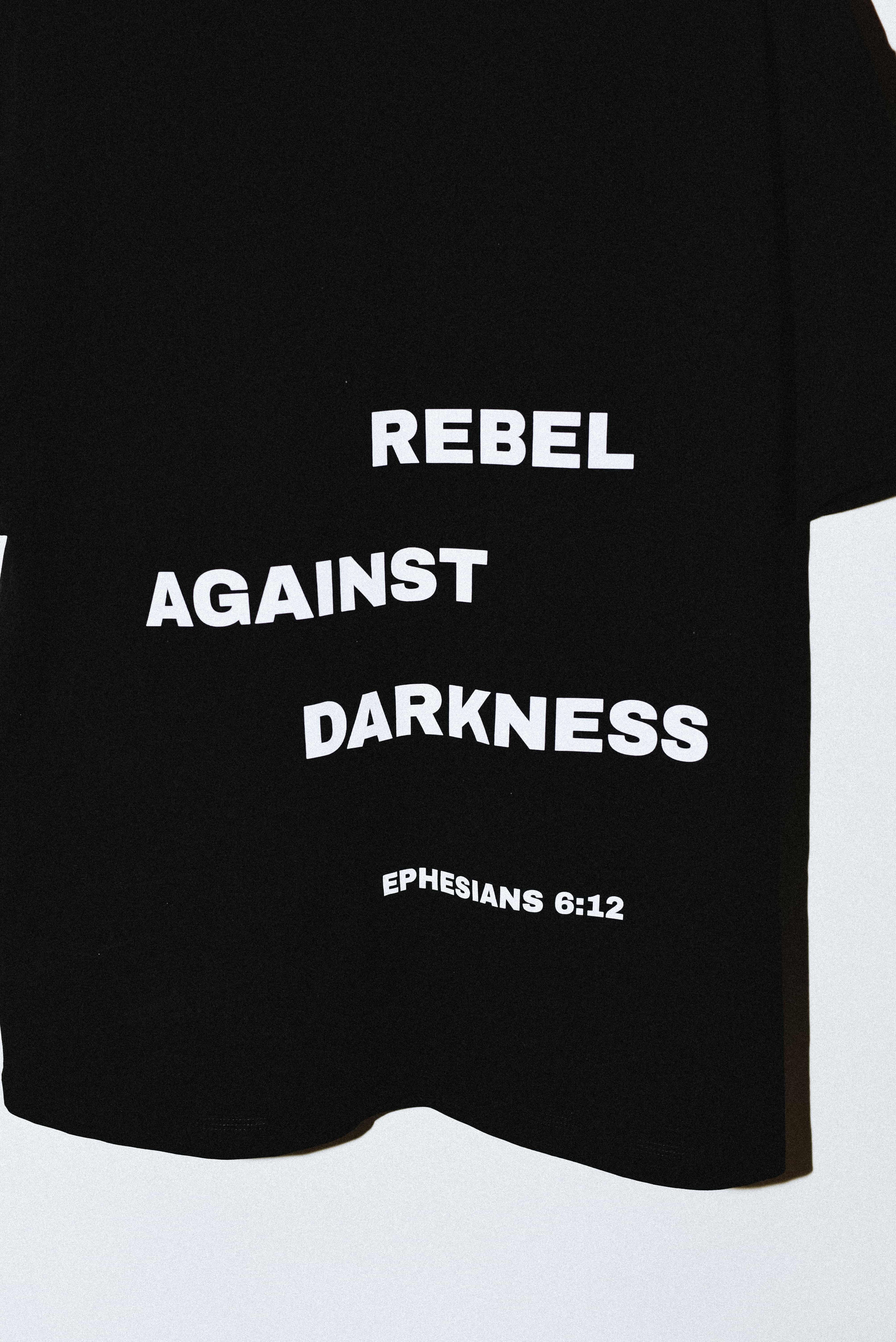 Rebel Against Darkness - Christian Unisex Oversized T-Shirt (back design)